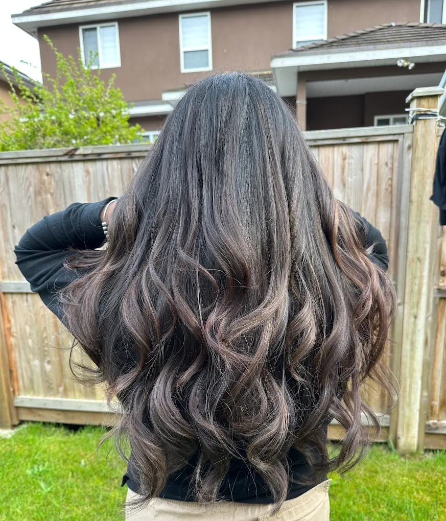 Ash brunette balayage with long curls created for a Surrey salon client