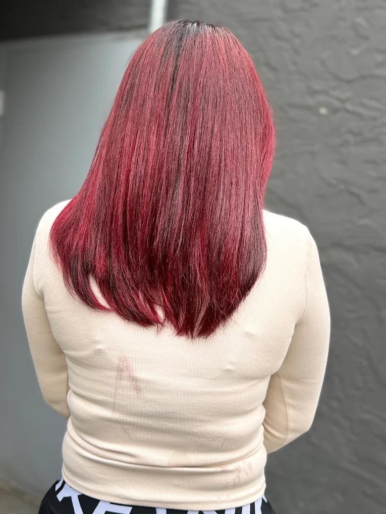 Burgundy red full hair colour and smooth cut created in Surrey BC