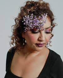 Curly floral editorial hair and makeup look created by Surrey artist Manpreet