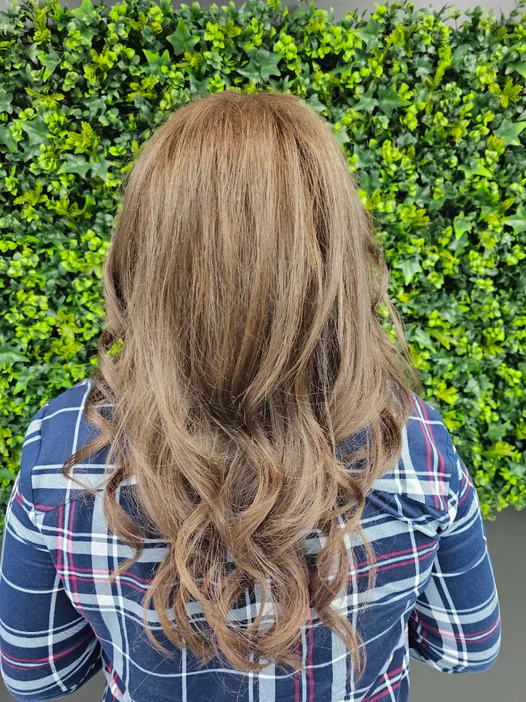 Soft caramel balayage and loose curls by Lux hair colourist Surrey