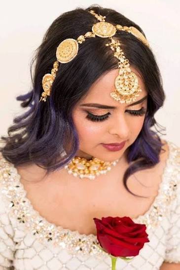 South Asian bridal hair and makeup with gold jewelry by Lux Hair and Skin Lounge Surrey
